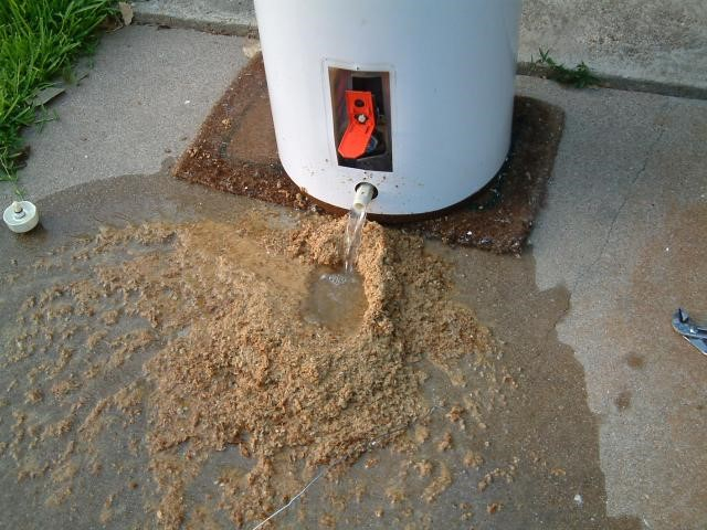 Mesa Plumber draining water heater