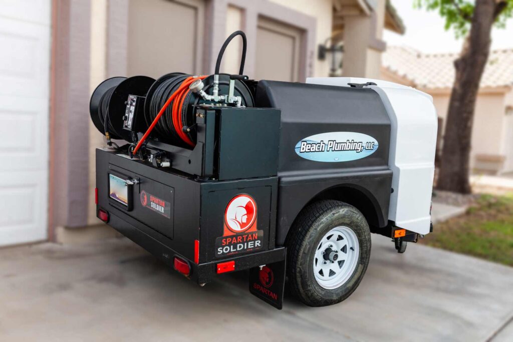 Commercial and Residential Hydro Jetting Machine. High-pressure water clears blockages.
